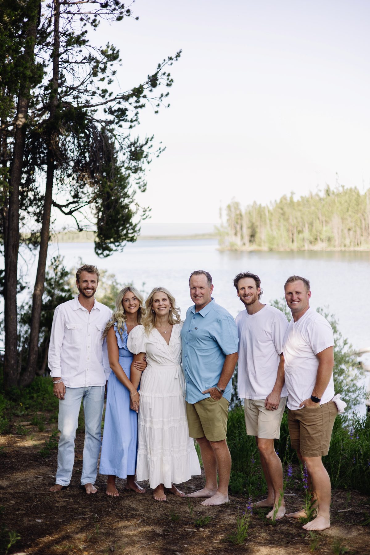 Tom Freeman and his family by a lake