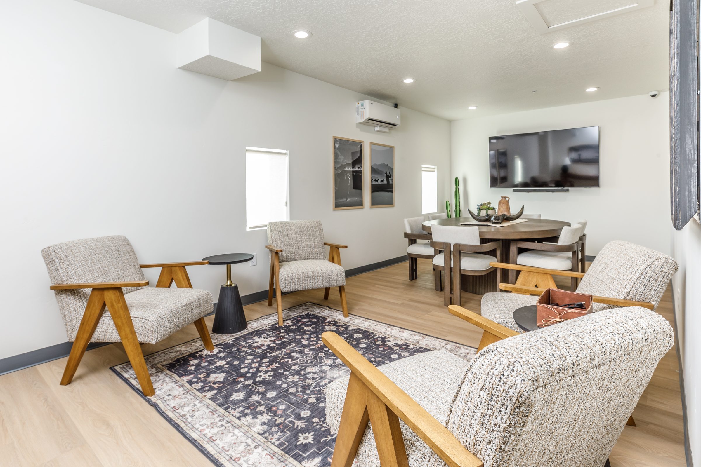 Conference room with lounge chairs and a dining table